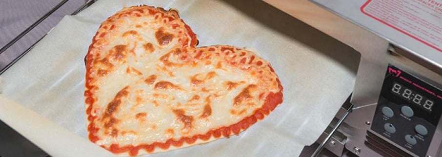 a heart-shaped pizza made through 3D printing