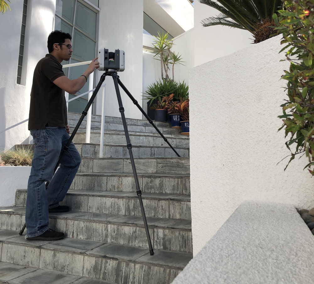 Person using a laser scanner